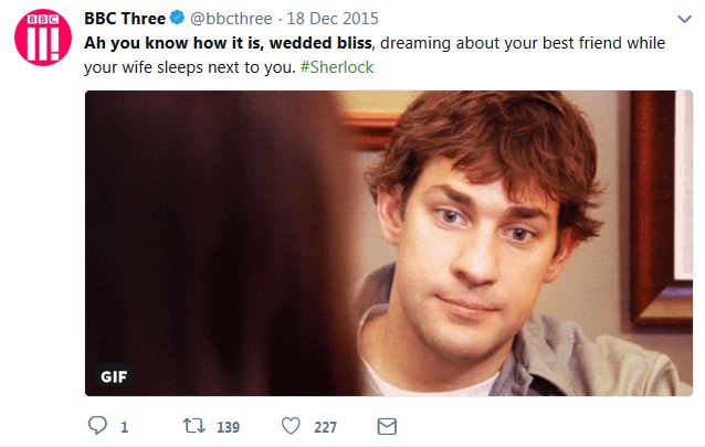 Color image of a white man looking pensive, facing a person, back to camera, with long brown hair. Tweet, dated December 18, 2015, is from BBC Three @bbcthree and reads: 'Ah you know how it is, wedded bliss, dreaming about your best friend while your wife sleeps next to you. #Sherlock.'