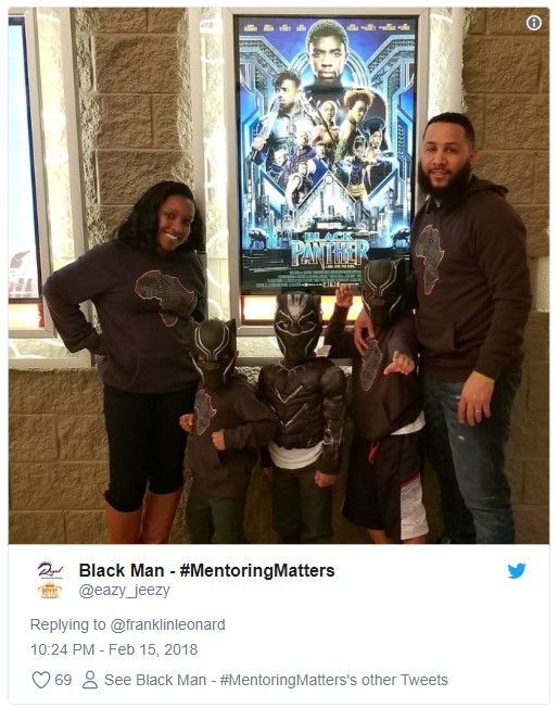 The tweet, which was posted on the opening weekend for the film, features an image of a family outside of a movie theater and in front of the Black Panther movie poster. They are wearing sweatshirts with images of the continent of Africa printed across them, and the children are wearing Black Panther character costume masks.