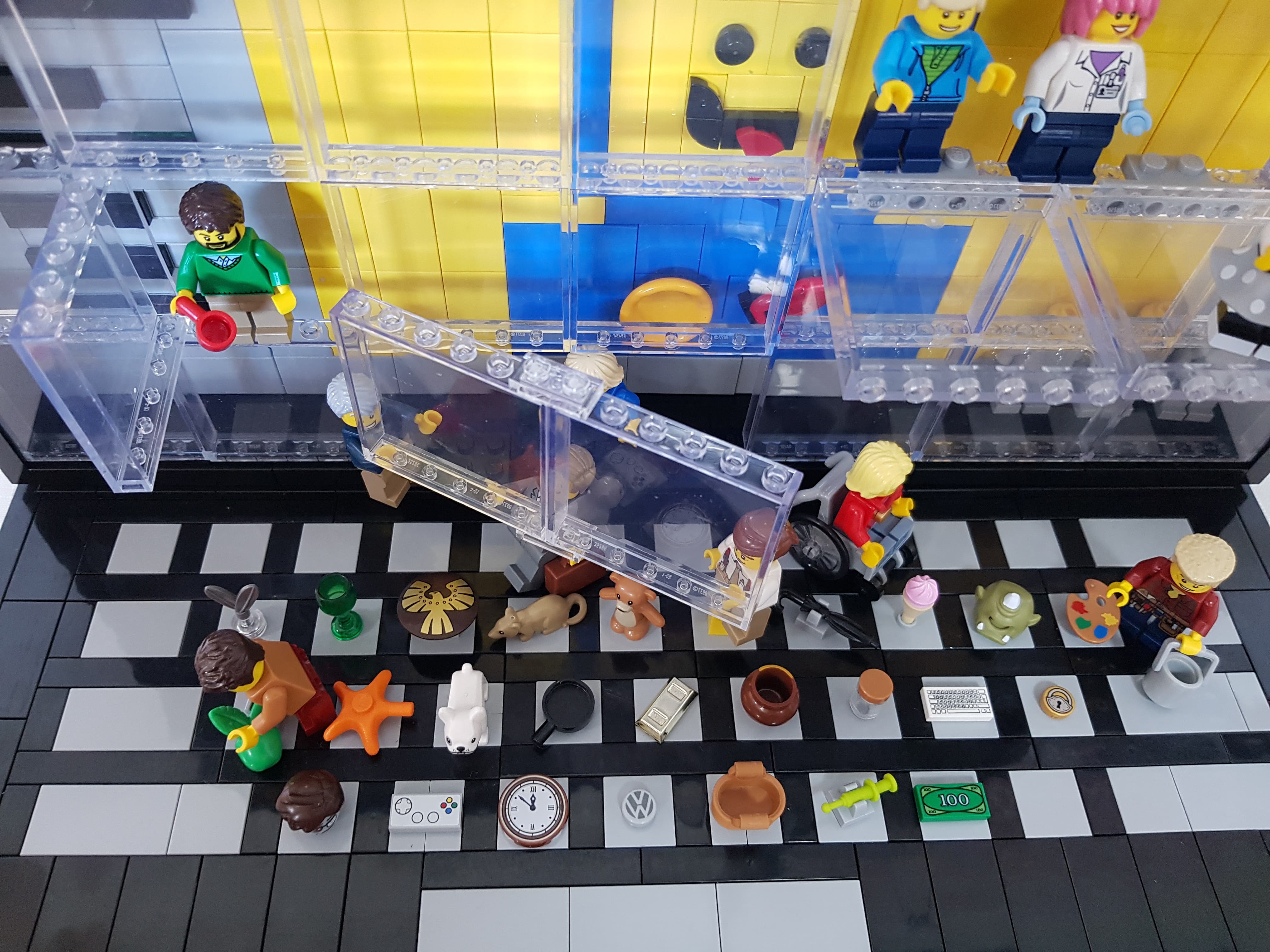 Image of laptop keyboard made of Lego with keys replaced by minifigure accessories of the same letter.