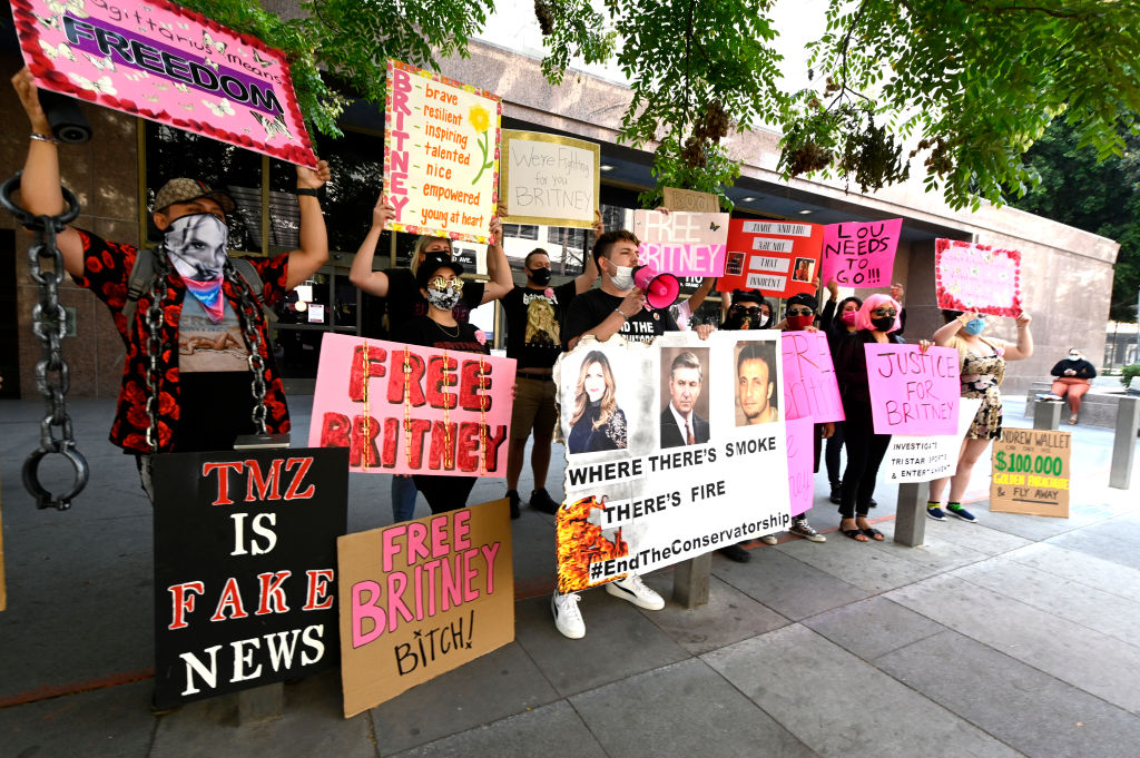 Line of pink-sign-wielding Free Britney protesters