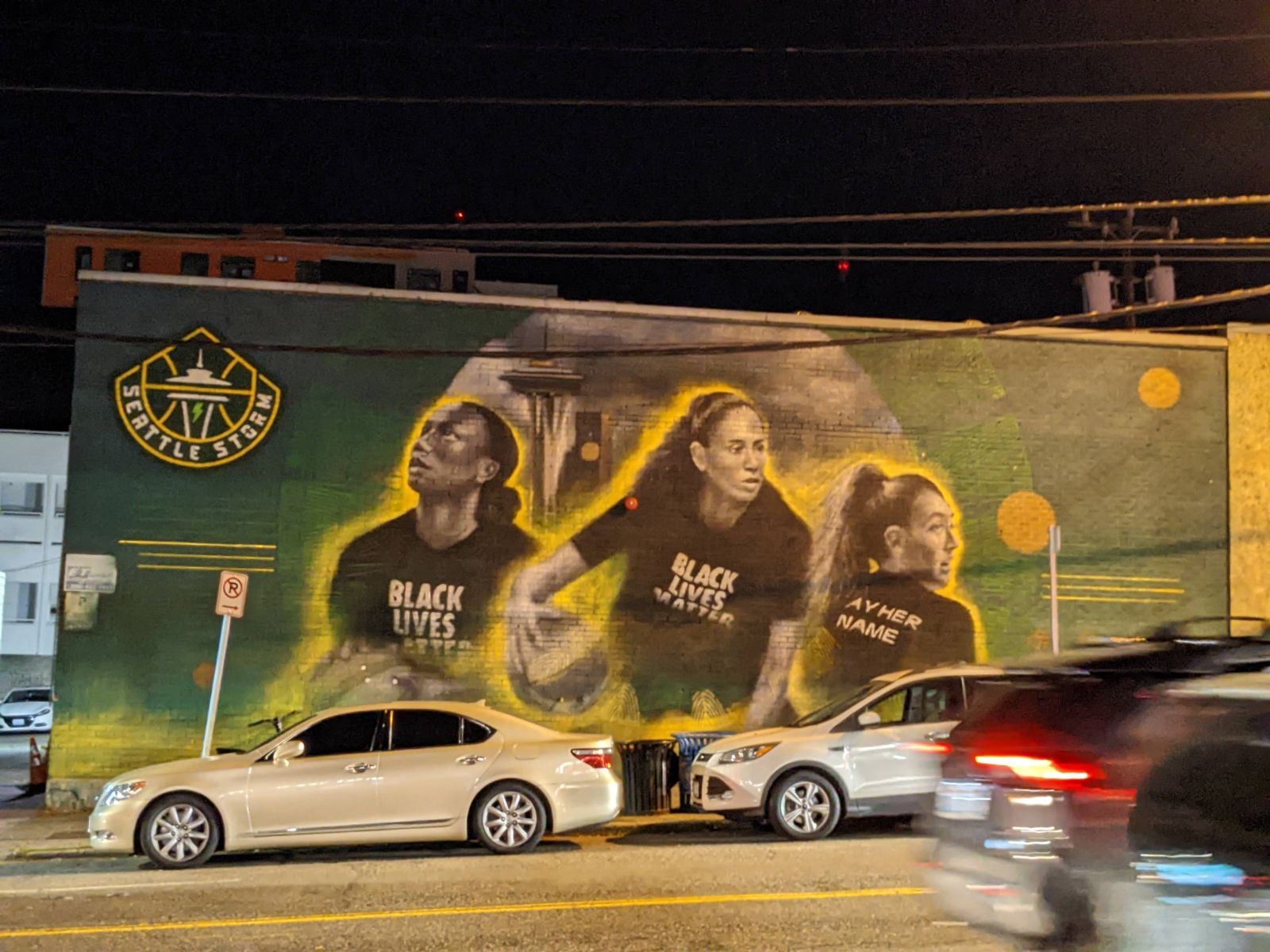 Loyd and Bird's shirts say 'Black Lives Matter' on the front; Stewart's says 'Say Her Name' on the back.