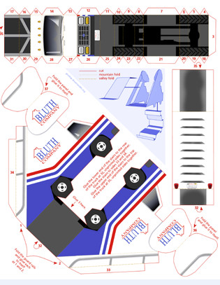 Color image of the flat paper model for the red, white, and blue striped truck imaged in figure 1, with directions written in red indicating how the paper ought to be cut, folded, and assembled.