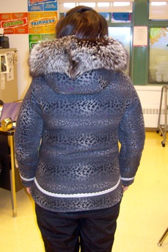 Back of a parka with leopard print.